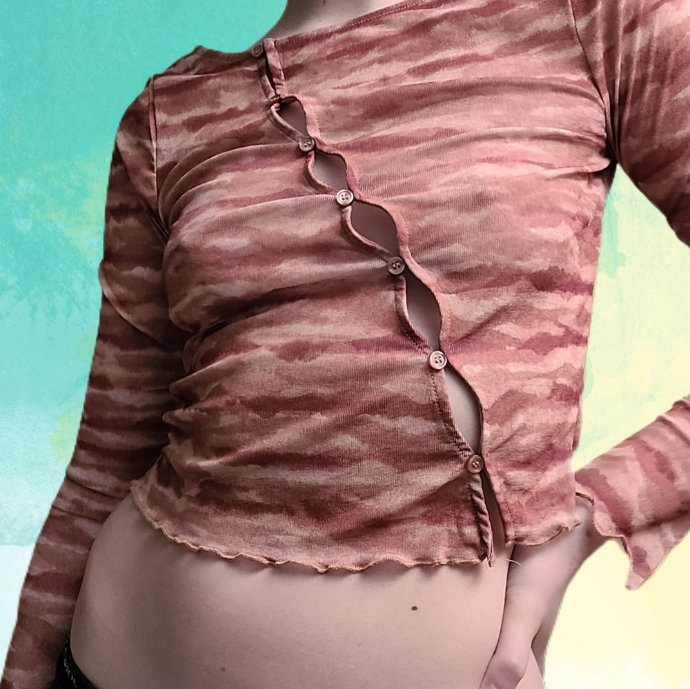 Asymmetrical long sleeve key hole top